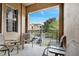 A relaxing balcony with patio furniture and a great view at 505 Terrace Ridge Cir # 505, Davenport, FL 33896