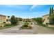 Gated community entrance with meticulously manicured landscaping, ensuring privacy and a warm welcome at 505 Terrace Ridge Cir # 505, Davenport, FL 33896