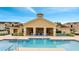 The community pool offers comfortable lounge chairs for relaxation, a tower feature, and easy access at 505 Terrace Ridge Cir # 505, Davenport, FL 33896