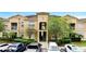 Inviting two-story condo with well-maintained landscaping and ample parking at 505 Terrace Ridge Cir # 505, Davenport, FL 33896