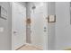 This hallway features two doors and neutral colored walls at 505 Terrace Ridge Cir # 505, Davenport, FL 33896