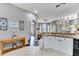 An open kitchen featuring ample countertop space and seamless transition to dining area at 505 Terrace Ridge Cir # 505, Davenport, FL 33896