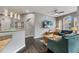 Open living space with hardwood floors, stylish furnishings, and natural lighting at 505 Terrace Ridge Cir # 505, Davenport, FL 33896