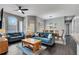 Cozy living room featuring comfortable seating and stylish décor adjacent to the dining area at 505 Terrace Ridge Cir # 505, Davenport, FL 33896