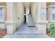 Exterior stairway leading to condo units with neutral-colored walls at 505 Terrace Ridge Cir # 505, Davenport, FL 33896