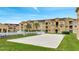 Exterior view of a well-maintained sand volleyball court in a condo community near the pool at 505 Terrace Ridge Cir # 505, Davenport, FL 33896