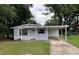 Charming single-story home with covered parking and a well-maintained lawn at 520 Ruffel St, Maitland, FL 32751