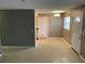 Cozy living room with access to kitchen, featuring neutral walls and access to front entrance at 520 Ruffel St, Maitland, FL 32751
