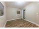 This is a bedroom featuring hardwood floors and a closet at 5201 Palisades Dr, Orlando, FL 32808