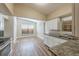 Updated kitchen offers breakfast nook, stainless appliances, and granite countertops at 5201 Palisades Dr, Orlando, FL 32808
