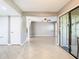 Entryway with stairs, tile floors and access to kitchen and living room at 6021 Windhover Dr # F11, Orlando, FL 32819