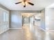 Bright living room featuring tile flooring, modern windows and neutral paint at 6021 Windhover Dr # F11, Orlando, FL 32819