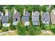This aerial view shows many homes with private pools and lush landscaping at 6037 Caymus Loop, Windermere, FL 34786