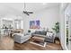 Open concept living and dining room featuring modern furnishings and artwork at 6037 Caymus Loop, Windermere, FL 34786