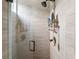 Modern shower with glass door and contemporary fixtures at 6037 Caymus Loop, Windermere, FL 34786