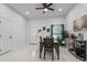Bright dining area with marble floors, recessed lighting, and stylish decor at 675 S Cedar Ave, Orange City, FL 32763