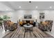 Cozy living room with marble floors, comfortable seating, and plenty of natural light at 675 S Cedar Ave, Orange City, FL 32763