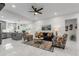 Airy living room featuring recessed lighting, marble floors, and stylish furniture at 675 S Cedar Ave, Orange City, FL 32763