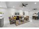 Bright open living room with marble floors, recessed lights, and casual seating at 675 S Cedar Ave, Orange City, FL 32763