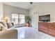 Living room with large window, comfortable seating, and TV at 730 Bloomingdale Dr, Davenport, FL 33897