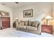 Living room with stylish sofa, lamps, and elegant decor at 730 Bloomingdale Dr, Davenport, FL 33897