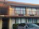 Exterior view of a multi-story building featuring small balconies with black metal railings at 7900 S Orange Blossom Trl # 2025, Orlando, FL 32809