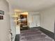 View of the combined kitchen and living room with a modern design at 7900 S Orange Blossom Trl # 2025, Orlando, FL 32809