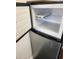 Modern mini refrigerator with ample storage space at 7900 S Orange Blossom Trl # 2025, Orlando, FL 32809