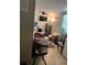 Bedroom featuring a fan, desk, and television at 8 E Summit St, Apopka, FL 32712