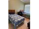 A bedroom with two twin beds and a window with blinds at 8 E Summit St, Apopka, FL 32712