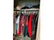 Walk-in closet with organized clothing racks and ample storage space at 8 E Summit St, Apopka, FL 32712