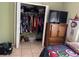 Bedroom walk-in closet featuring ample storage space for shoes and clothing at 8 E Summit St, Apopka, FL 32712