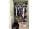 Walk-in closet with organized clothing racks, shoes and other items for storage at 8 E Summit St, Apopka, FL 32712