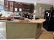 A large kitchen with an island and lots of counter space at 8 E Summit St, Apopka, FL 32712