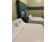 Functional laundry room featuring white washer and dryer units at 8 E Summit St, Apopka, FL 32712