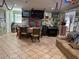 An interior living room view showcases decor, tile flooring, and natural light creating a relaxing atmosphere at 8 E Summit St, Apopka, FL 32712