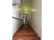 Interior stairway view, with wooden steps at 8 E Summit St, Apopka, FL 32712