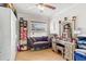 Well-organized closet space featuring a vanity area, shelves, and a cozy sofa, providing ample storage at 8453 Firefox Cv, Orlando, FL 32835