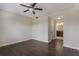Bedroom featuring hardwood floors, neutral walls, and a ceiling fan at 8925 Azalea Sands Ln # 602, Davenport, FL 33896