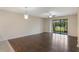 Bright and airy living space with stylish flooring and a seamless transition to the outdoor patio at 8925 Azalea Sands Ln # 602, Davenport, FL 33896