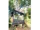 Unique custom-built two-story treehouse with a covered porch and a scenic view at 29540 Deerwood Farms Rd, Sorrento, FL 32776