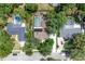 Aerial view of the property featuring a pool in a private, screened-in backyard at 105 Valley Ct, Longwood, FL 32779