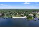 Scenic aerial view highlighting the waterfront community and lake access at 105 Valley Ct, Longwood, FL 32779