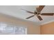 Bedroom featuring a ceiling fan, crown molding, and window with blinds at 105 Valley Ct, Longwood, FL 32779
