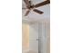 Bedroom with ceiling fan, sliding closet doors, and an entryway at 105 Valley Ct, Longwood, FL 32779