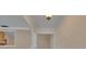 View of the foyer with white trim and an archway leading to other areas of the home at 105 Valley Ct, Longwood, FL 32779