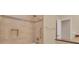Tiled shower and bath featuring updated fixtures, hand rails and built in alcove at 105 Valley Ct, Longwood, FL 32779