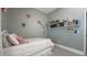 Sweet bedroom with a bed and decor at 10879 Norcross Cir, Orlando, FL 32825