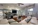 Spacious living room with modern furniture and hardwood floors at 10879 Norcross Cir, Orlando, FL 32825
