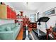 Bright exercise room with fitness equipment, hardwood floors, and ample storage at 11718 Fitzgerald Butler Rd, Orlando, FL 32836